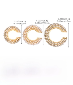 Detailed size chart showing three sizes of gold pearl and rhinestone hoop earrings