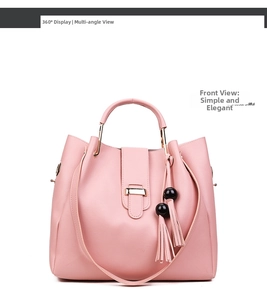 Pink minimalist handbag front view featuring golden clasp and elegant bead tassel detail