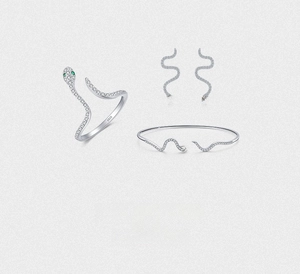 Detailed view of S925 sterling silver snake jewelry set with micro-pave stones and green eyes