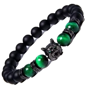 Detailed close-up of tiger eye beaded bracelet with a black metal wolf head charm