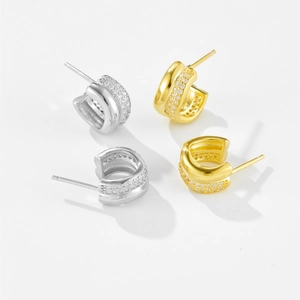 Retro curved S925 silver stud earrings with sparkling pavé cubic zirconia gemstones