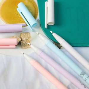 Morandi gel pen set with 6 colors on a cozy desk featuring pastel pens and coffee