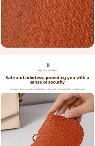 Close-up of orange litchi texture PU leather eyewear case with metal buckle and knit lining