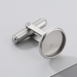 Polished silver stainless steel cufflink with round base and crystal inlay detail