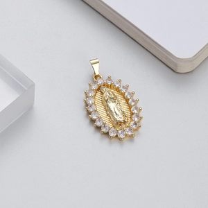 Close-up of 14K gold plated Virgin Mary pendant with sparkling cubic zirconia inlay