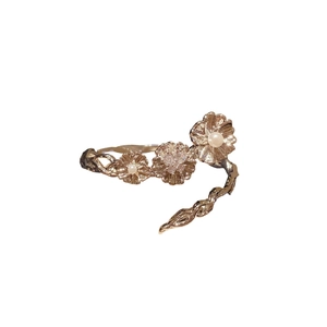 Vintage floral bracelet with zircon and pearls featuring a delicate vine flower design