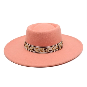 Close-up of wide brim wool hat with bohemian geometric pattern woven band