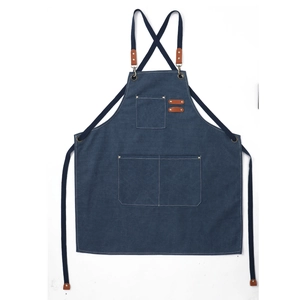 Waterproof navy blue thick canvas work apron with leather straps and large tool pockets