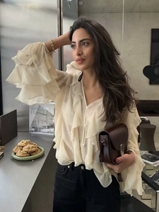 Elegant beige ruffled chiffon V-neck blouse with layered sleeves and modern styling
