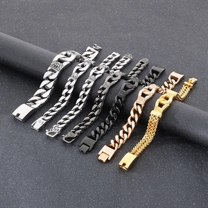 Close-up of men's stainless steel Cuban link bracelets in silver, gold, and black colors