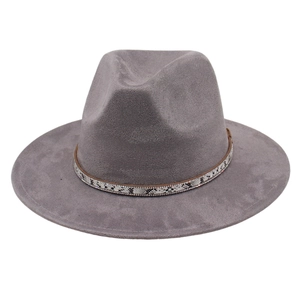 Grey felt fedora hat with snakeskin band and rhinestone accents on white background