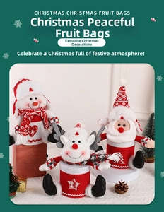 Detailed close-up of knitted Christmas gift bags with snowman and reindeer designs