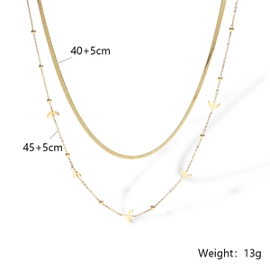 Double-layered gold titanium necklace with plane and clover charms, weights 13g
