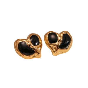 Elegant gold heart earrings with black enamel inlay and textured vintage metallic finish