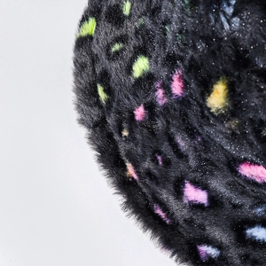 Colorful leopard plush bucket hat with vibrant faux fur texture for autumn and winter