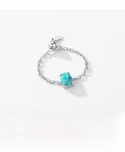 Detailed macro of S925 sterling silver chain ring with adjustable opal stone setting