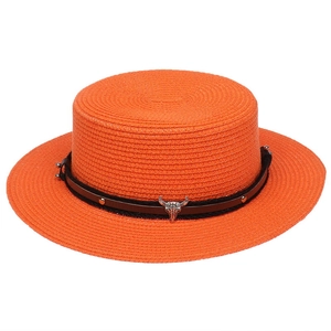 Orange flat top straw hat with a dark band and silver bull skull metal buckle