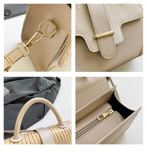 Detailansicht der beigen Handtasche mit goldener Hardware und Krokodilmuster am Griff