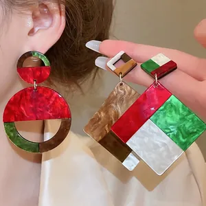 Statement acrylic geometric earrings in colorful resin design with round and diamond shapes