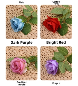 Detailed close-up of artificial roses in blue, red, pink, and purple silk petals