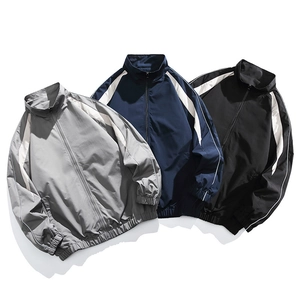 Men's casual stand collar windbreaker jackets with contrast stripes in gray, navy, and black