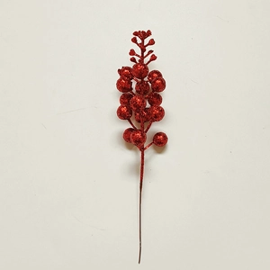 Close-up of bright red Christmas glitter berry spray branches for DIY holiday decor