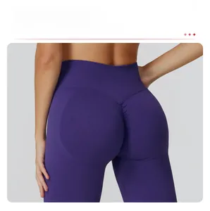 Detail of high-waist seamless yoga pants featuring purple scrunch butt lifting texture