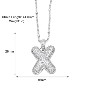 Detailed view of silver letter X pendant with dimensions 26mm by 16mm and full zircon stones