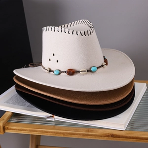 Detail of western cowboy hats with turquoise beads, shell trim, and stitched edges