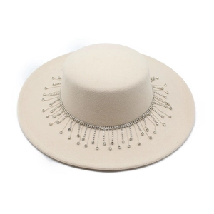 Close-up of flat-top wool felt boater hat with luxurious silver rhinestone fringe trim