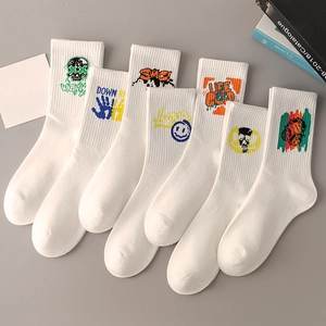 Flat lay of white cotton crew socks with colorful street style prints and graphics