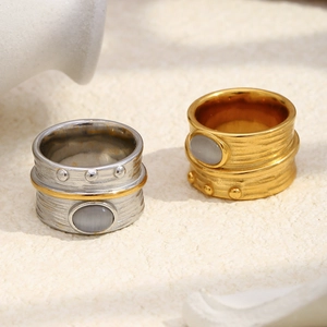 Bagues vintage en acier inoxydable plaqué or 18 carats et argent avec pierre œil de chat grise