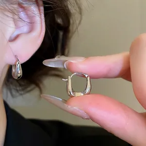Minimalist silver 18K gold plated U-shaped huggie earrings with sleek polished finish