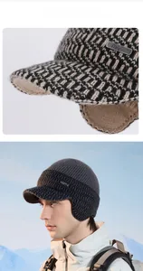 Detailed knit texture and 6cm brim on a winter trapper hat with fleece ear protection