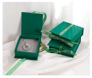 Emerald green flip jewelry gift box with grey flocking lining and Best Wishes ribbon