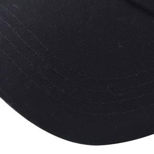 Close-up of the black washed cotton baseball cap brim with durable reinforced four-row stitching