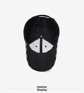 Detailed interior view of black baseball cap showing mesh lining and Fashion logo print