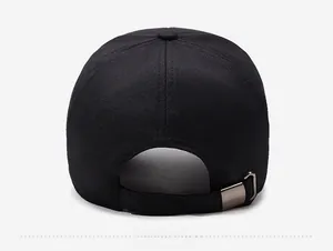 Detail of the black baseball cap rear view showing the adjustable metal buckle closure