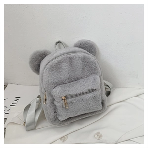 Detail of grey plush backpack with cute round ear design and smooth zip closure
