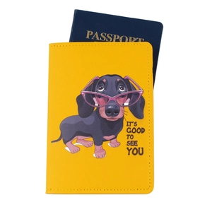 Yellow faux leather passport holder featuring a cute cartoon dachshund and travel document