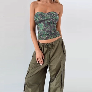Close-up of green camo tube top and military style drawstring cargo pants for women