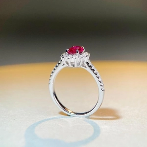 Elegant S925 sterling silver ring with oval ruby red stone and white zircon halo