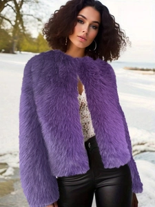 Detail of purple faux fur texture and long sleeve design on a cropped winter jacket for women