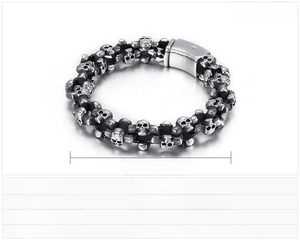 Detail view of gothic skull link bracelet in stainless steel with a square clasp buckle