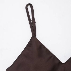 Deep brown satin dress featuring adjustable spaghetti straps and elegant V-neck detail