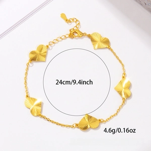 Detail of gold heart charm bracelet with sunray texture and 24cm adjustable chain length