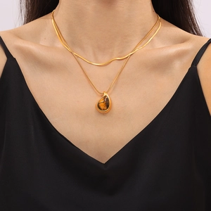Double-layered 18k gold plated titanium necklace with teardrop tiger eye stone pendant