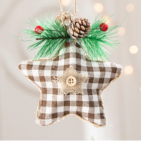Detail of Christmas star ornament with plaid fabric, burlap star, pine cones and red berries
