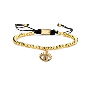 Bracciale occhio portafortuna regolabile con perline dorate e zirconi colorati