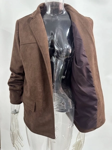 Detail of burgundy faux suede blazer featuring notched lapels and satin lining